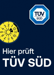 TÜV SÜD-Logo mit einem gelben Prüfplakettchen und dem deutschen Text „Hier prüft TÜV SÜD“ auf dunkelblauem Hintergrund.